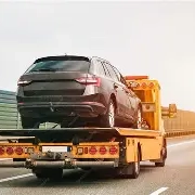 car being towed on flatbed after breakdown - home equity refinancing options